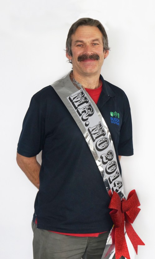 Proudly wearing championship sash which read, "Mr. Mo, 2014"