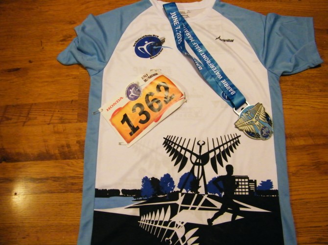 My running bib, cool event jersey, and sweet finishers medal! :)