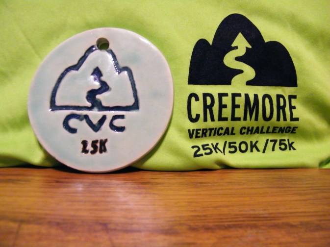 My new favourite finisher medal...handcrafted ceramic, with a cherished technical shirt. :)