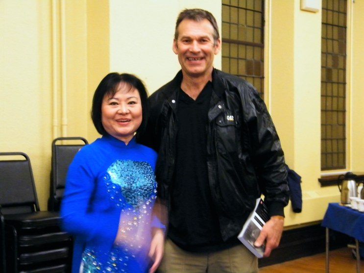 Several cameras taking pictures. Kim was saying, "which one do I look at"