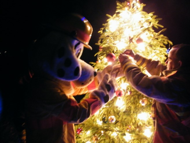 One of our wonderful volunteer firefighters and "Sparky", the fire department mascot! :)