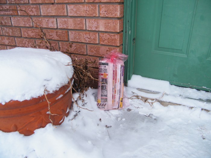 The newspaper was to be delivered before 6 to each house, placing it on end immediately beside the door.