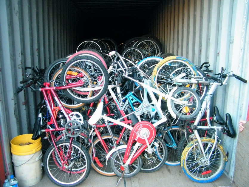 Bikes put away at the end of the day. It is an art to learn how to tightly stack them without any damage to the bike.