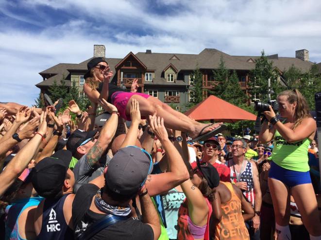Cassie Smith, the 2nd place winner in the female division being crowd-surfed off stage. Photo credit Facebook feed North Face Endurance Challenge
